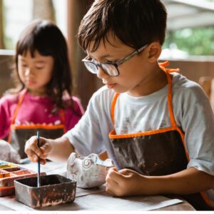 Children painting crafts